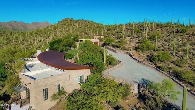view from above of property featuring a mountain backdrop
