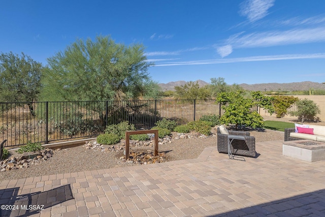 view of patio / terrace with a mountain view