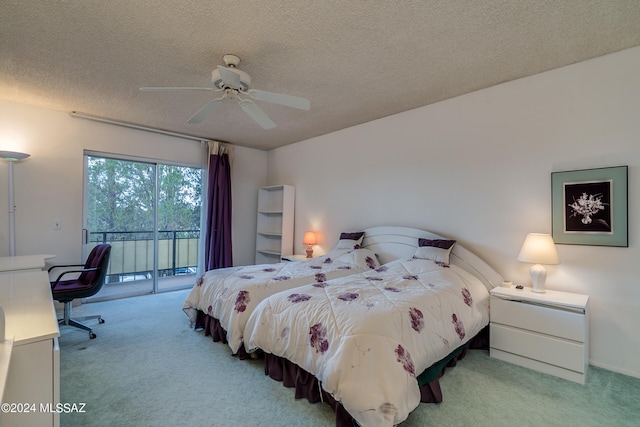 carpeted bedroom with ceiling fan, a textured ceiling, and access to exterior