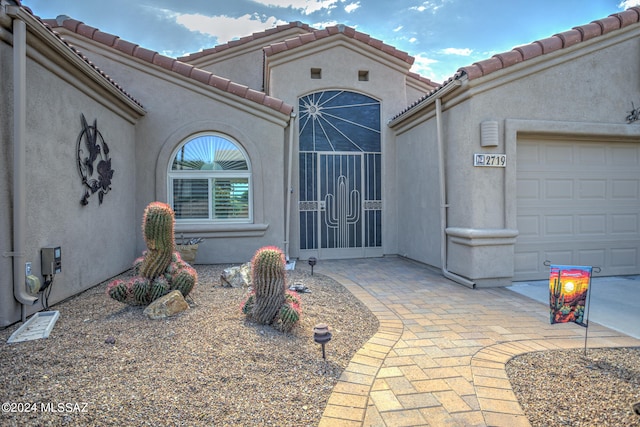 entrance to property with a garage