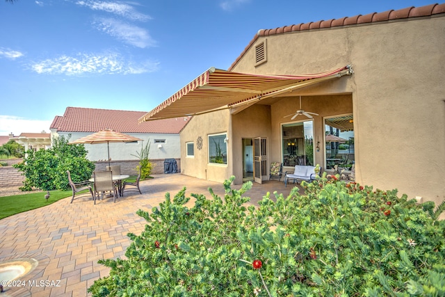 back of property featuring a patio area