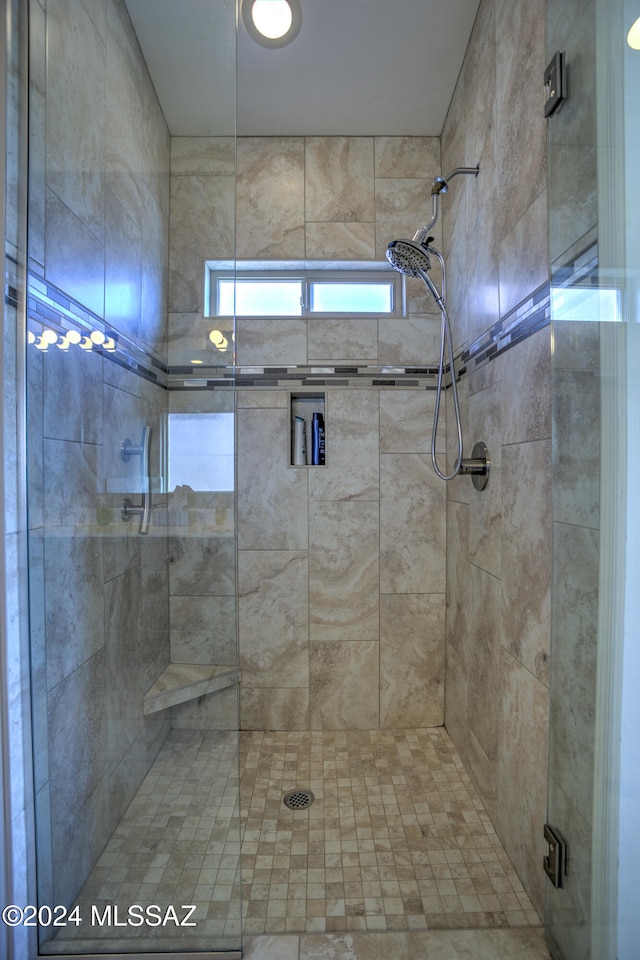 bathroom with an enclosed shower