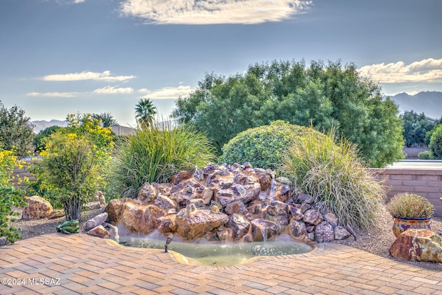 view of patio / terrace with a mountain view