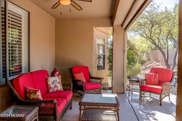 view of patio featuring an outdoor living space and ceiling fan