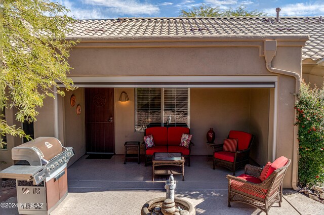 view of patio featuring outdoor lounge area and area for grilling