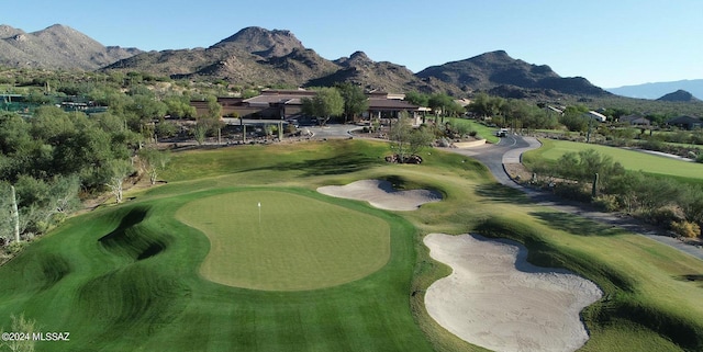 surrounding community with a mountain view