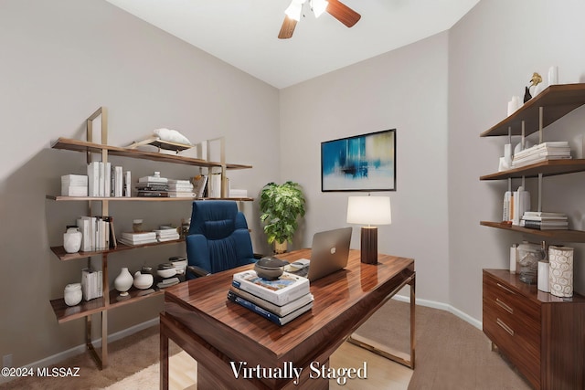 office with light colored carpet and ceiling fan