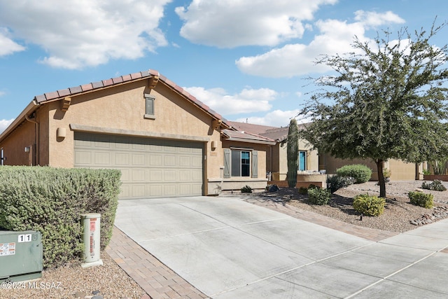 view of front of home with a garage