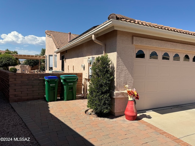 exterior space with a garage