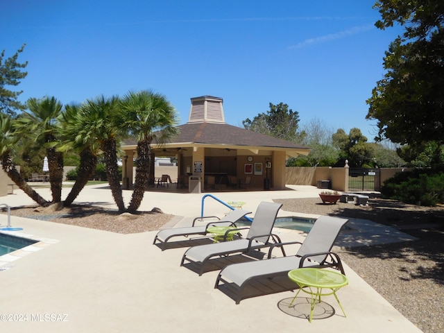 view of pool with a gazebo and a patio