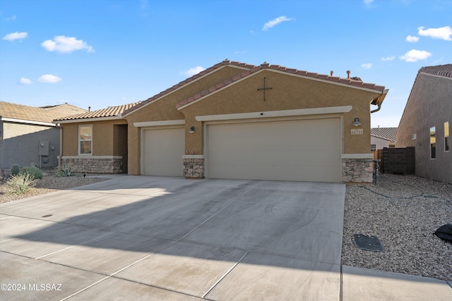 view of front of home with a garage