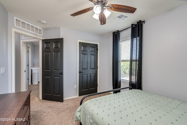 carpeted bedroom with ceiling fan