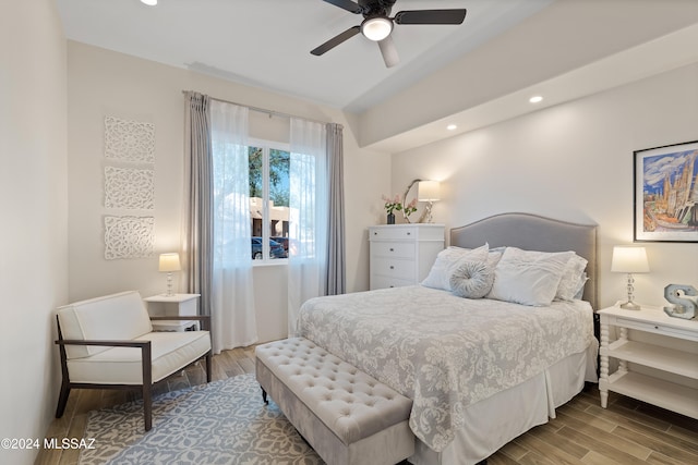 bedroom with wood-type flooring and ceiling fan