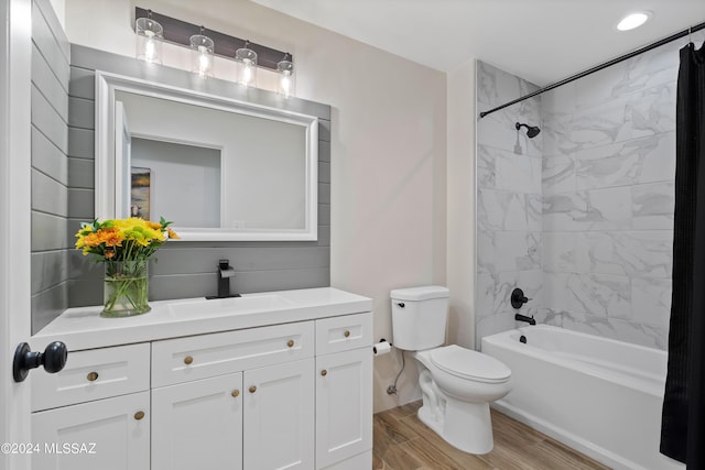 13123 E Molokai Ln, Vail, AZ 85641 - full bathroom with vanity, toilet, wood finished floors, and shower / washtub combination