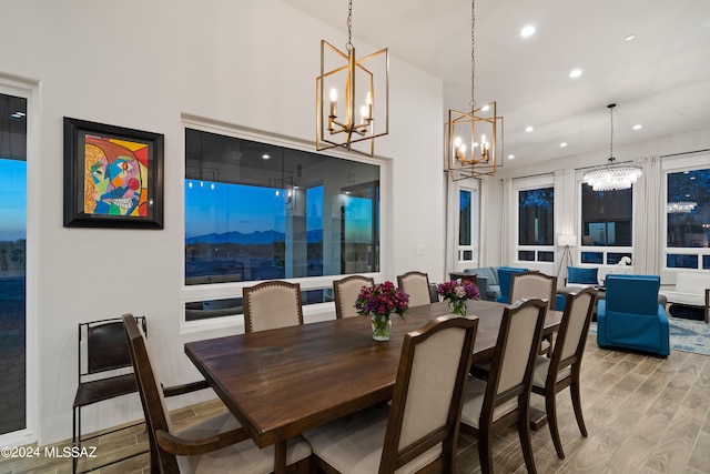 dining space with light hardwood / wood-style floors