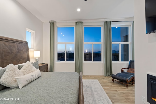 bedroom with light hardwood / wood-style flooring