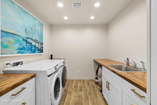 13123 E Molokai Ln, Vail, AZ 85641 - laundry area with recessed lighting, a sink, visible vents, and washing machine and clothes dryer