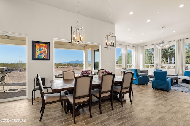 13123 E Molokai Ln, Vail, AZ 85641 - dining area featuring recessed lighting, wood finished floors, and a notable chandelier