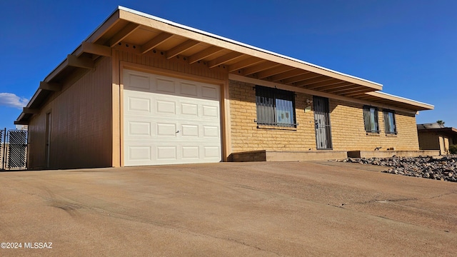 exterior space with a garage