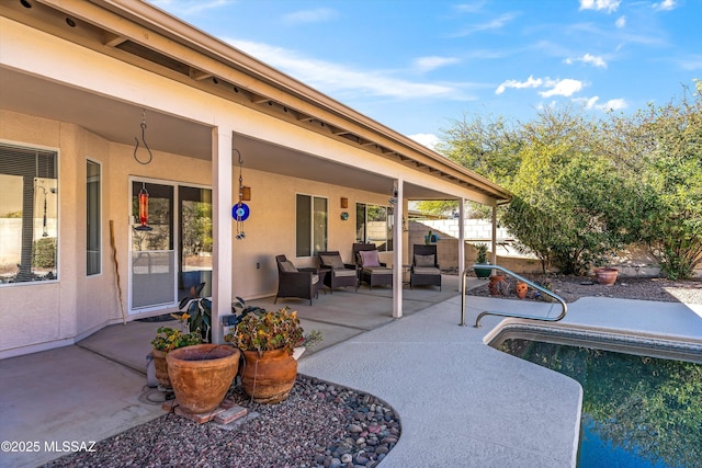 view of pool featuring a patio area and outdoor lounge area