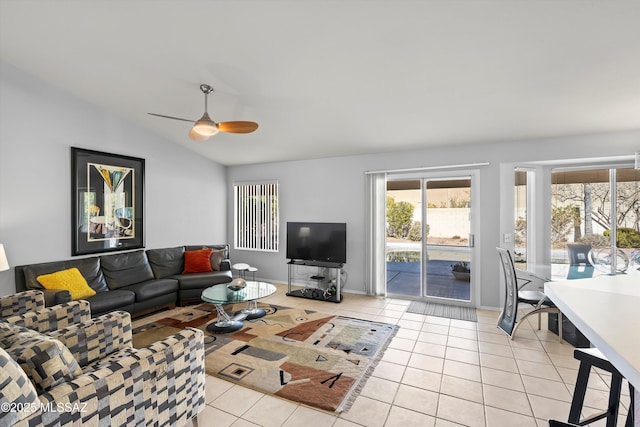 tiled living room featuring vaulted ceiling and ceiling fan