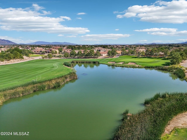 aerial view featuring a water and mountain view