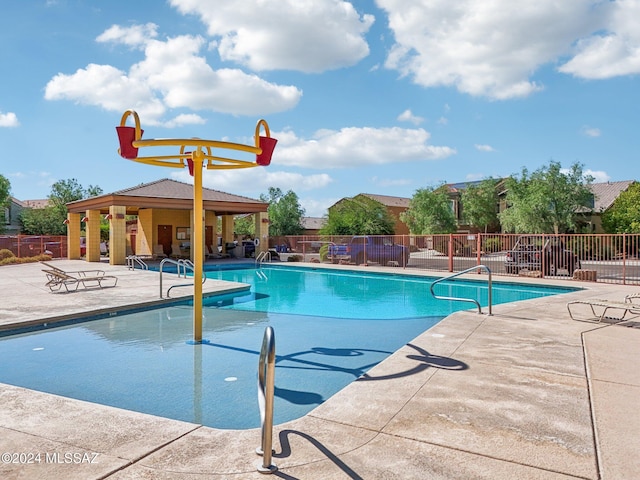 view of pool with a patio area