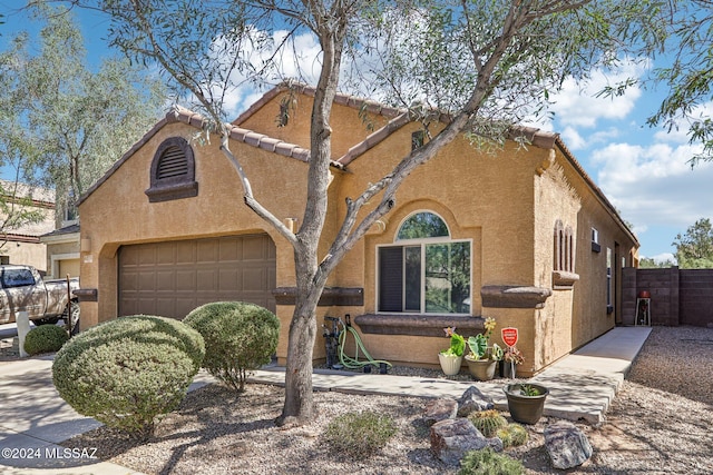 view of front of home with a garage