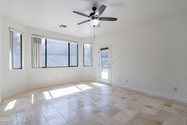 empty room featuring ceiling fan