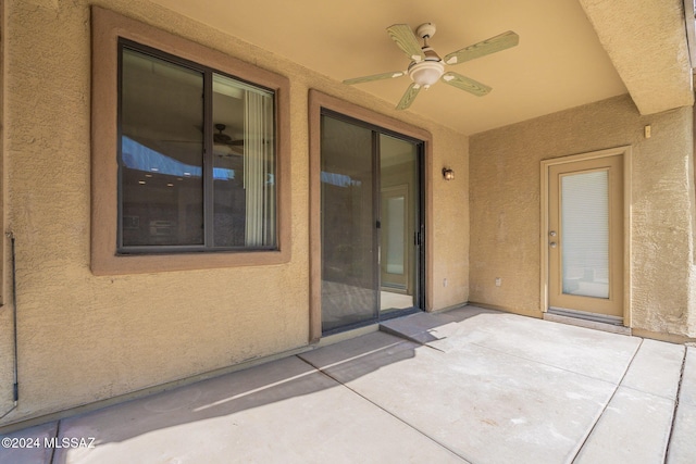 view of patio featuring a ceiling fan