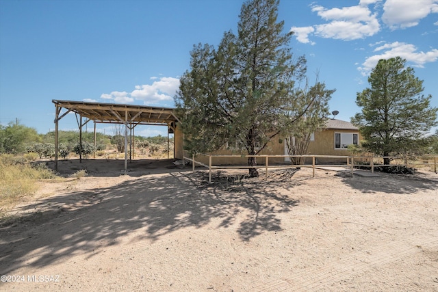 view of yard with a carport