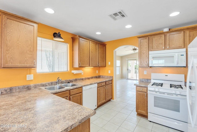 kitchen with ceiling fan, light tile patterned floors, sink, and white appliances