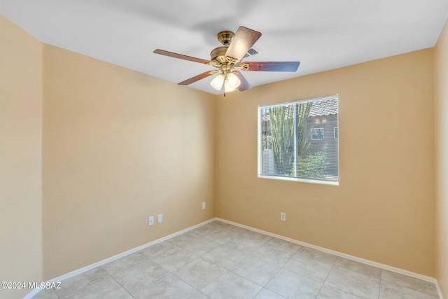 unfurnished room with ceiling fan