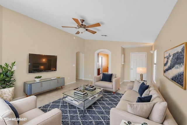 living room with lofted ceiling and ceiling fan