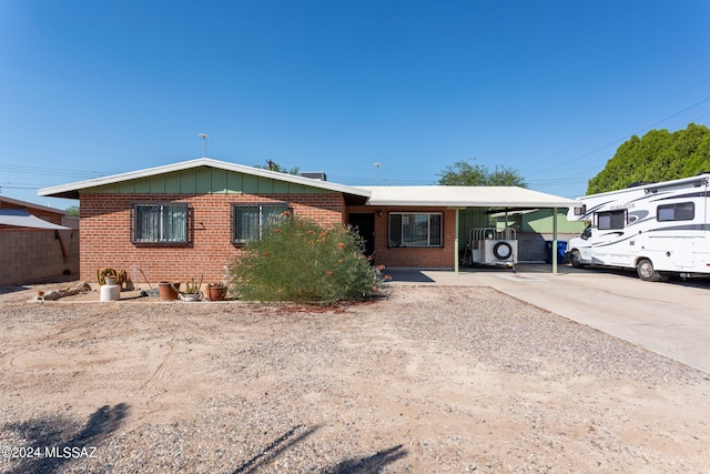 view of front of house with a carport