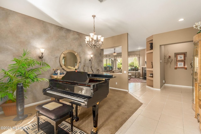 miscellaneous room featuring light tile patterned floors and ceiling fan with notable chandelier