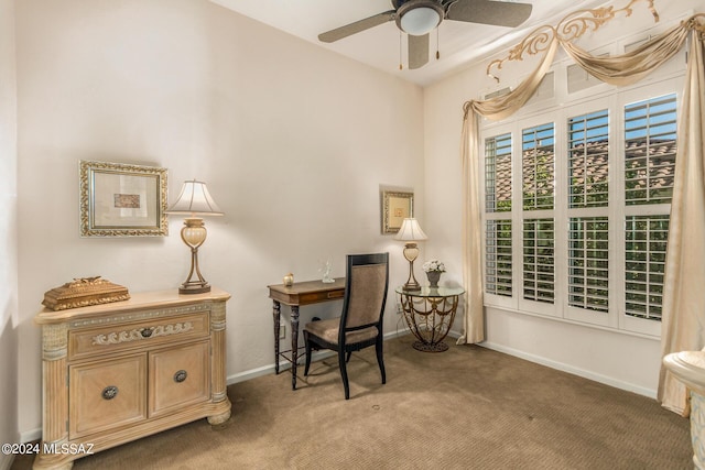 office space with ceiling fan and carpet