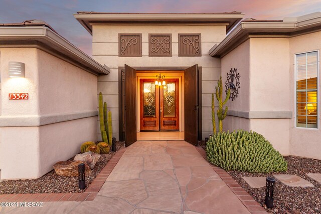 view of front of home featuring a mountain view and a garage