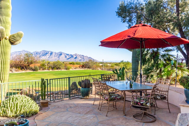 view of patio / terrace featuring a mountain view