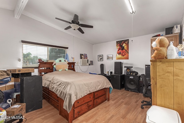 bedroom featuring ceiling fan, beamed ceiling, and light hardwood / wood-style flooring