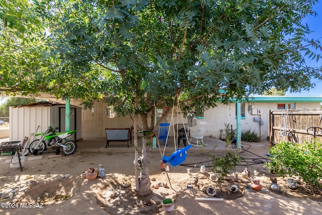 rear view of property with a patio