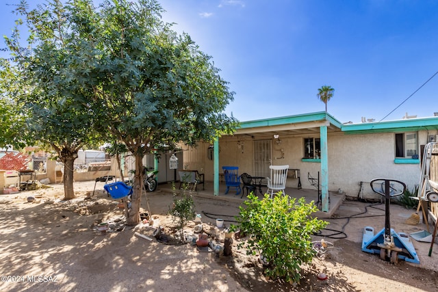 rear view of property with a patio area