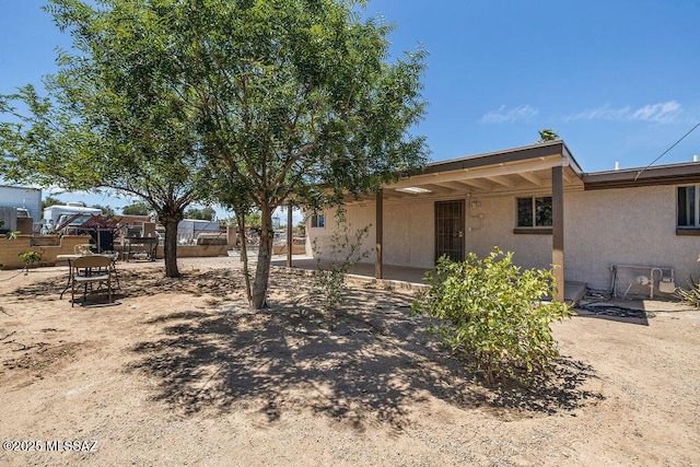 view of front of home with stucco siding