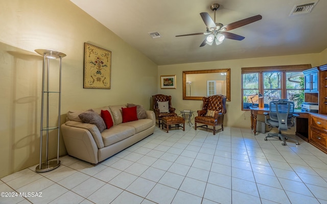 living room with vaulted ceiling, ceiling fan, and light tile patterned flooring