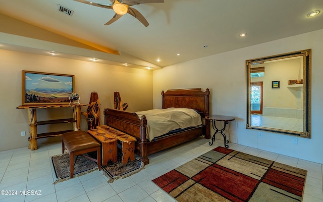 tiled bedroom with ceiling fan and lofted ceiling