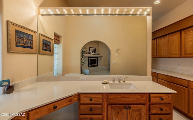 bathroom with tile patterned floors and vanity