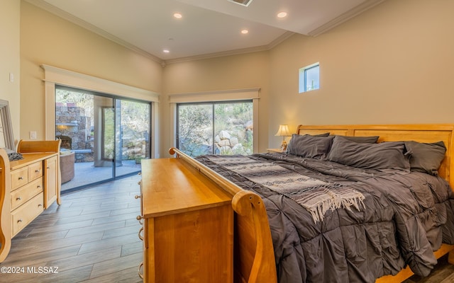 15251 N Dove Canyon Pass, Marana, AZ 85658 - bedroom with access to exterior, wood finished floors, ornamental molding, and recessed lighting