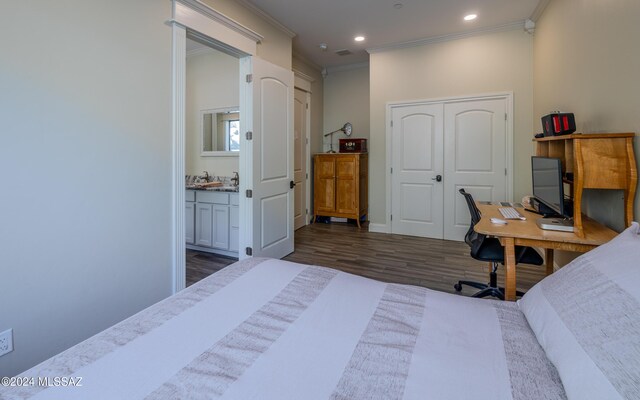 15251 N Dove Canyon Pass, Marana, AZ 85658 - bedroom featuring ornamental molding, dark wood-type flooring, a desk, a closet, and recessed lighting
