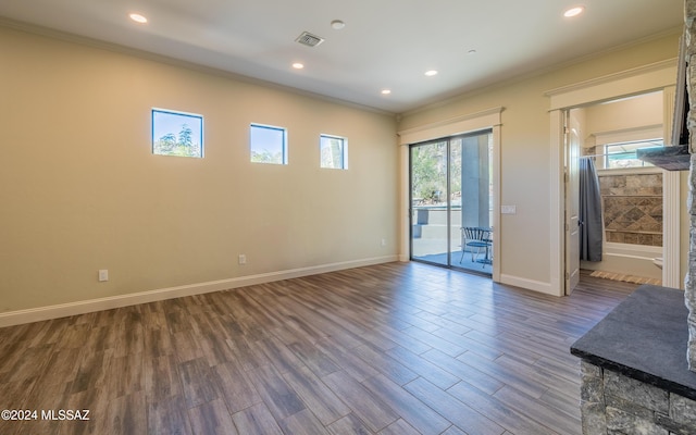 15251 N Dove Canyon Pass, Marana, AZ 85658 - spare room with crown molding, wood finished floors, baseboards, and recessed lighting
