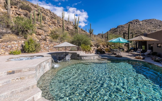 15251 N Dove Canyon Pass, Marana, AZ 85658 - outdoor pool with a mountain view and a patio